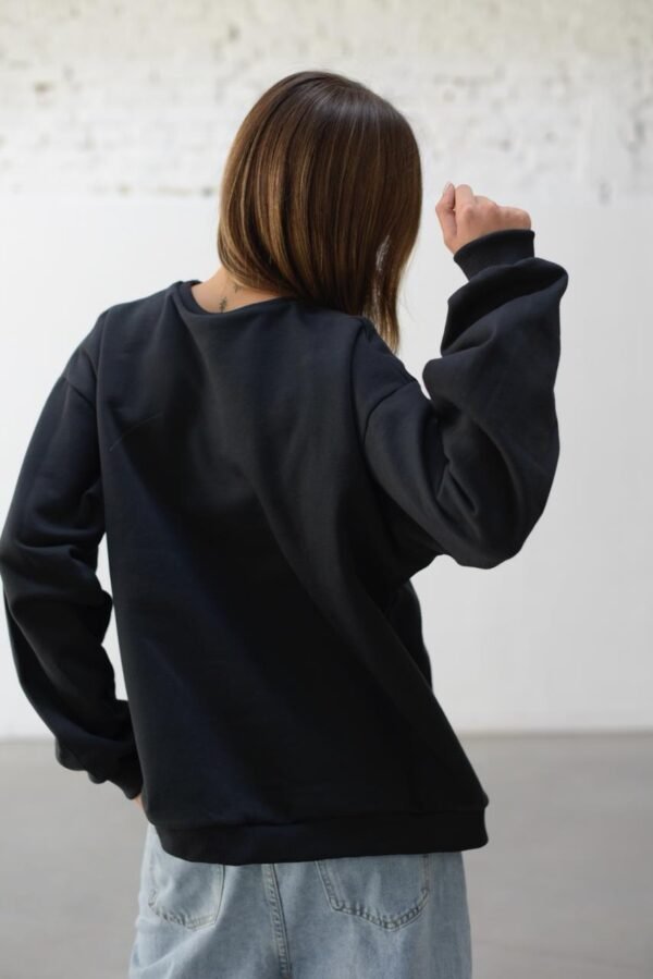 WhatsApp Image 2026-02-20 at 11.29.20 (3) Buzo Cuello Redondo ST Ne